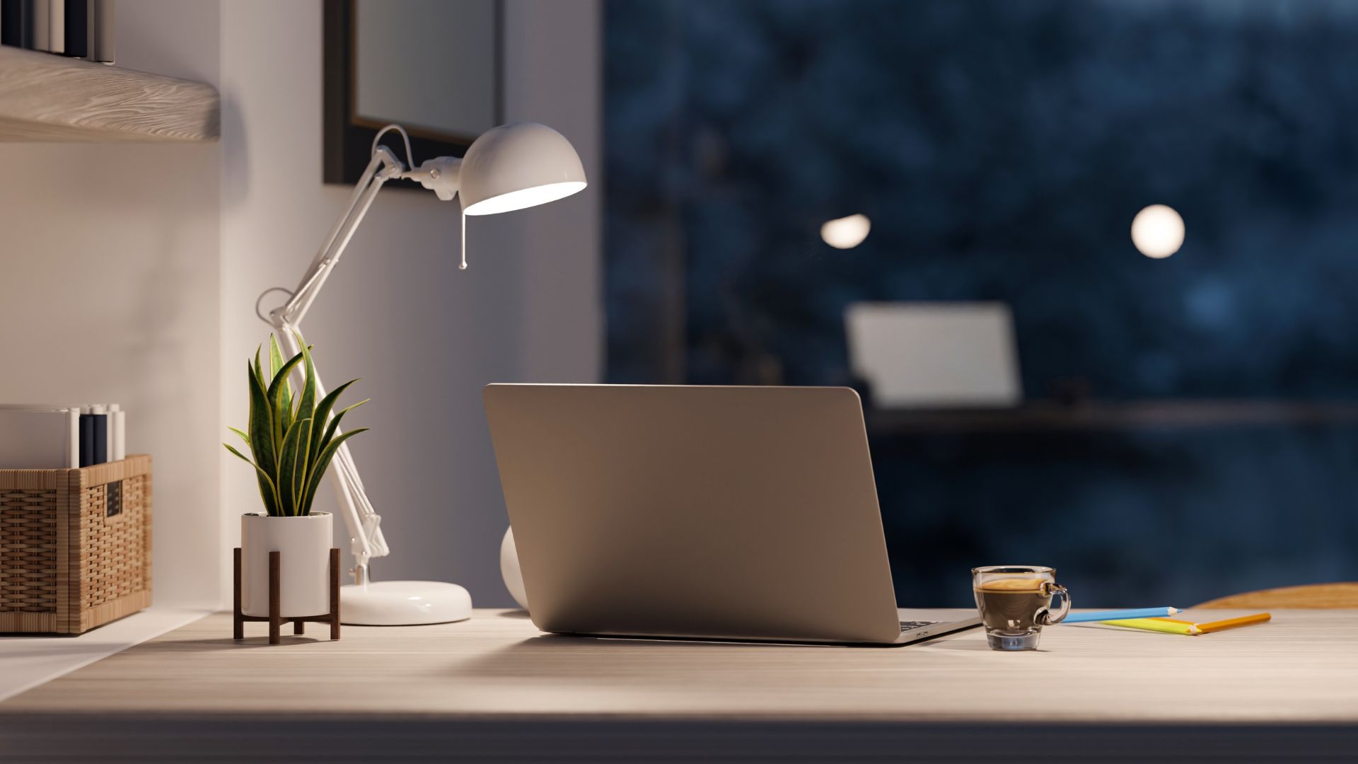Desk with notebook and warm lamp light for a focused work block